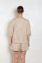 The Saria Top Linen by Suzie Kondi is an easy linen top with a simple and effortlessly chic silhouette made for versatility