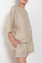 The Shkip Shorts Linen by Suzie Kondi is an A-line shorts with an elastic waistband and roomy pockets. An easy, pull-on style.