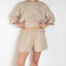 The Shkip Shorts Linen by Suzie Kondi is an A-line shorts with an elastic waistband and roomy pockets. An easy, pull-on style.