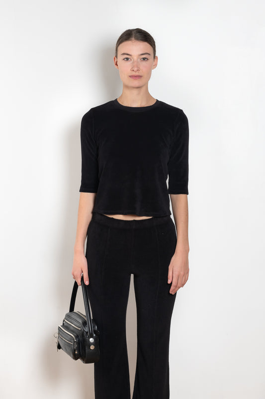 The Corfu Elbow Sleeve by Suzie Kondi is a terry top with a fitted silhouette and a elbow length sleeve