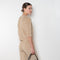 The Corfu Elbow Sleeve by Suzie Kondi is a terry top with a fitted silhouette and a elbow length sleeve