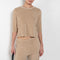The Corfu Elbow Sleeve by Suzie Kondi is a terry top with a fitted silhouette and a elbow length sleeve