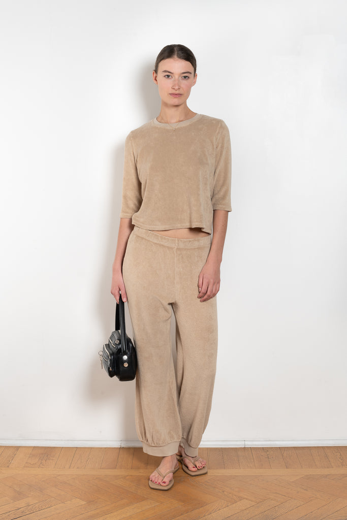 The Corfu Elbow Sleeve by Suzie Kondi is a terry top with a fitted silhouette and a elbow length sleeve