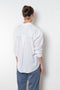 The Jordy Shirt by Xirena is&nbsp;an easy button-front shirt with a boxy fit, left chest pocket, and high low shirttail hem