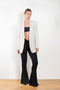 The Guia Blazer by The Andamane is a relaxed oversized blazer with all-over crystals in a bright white