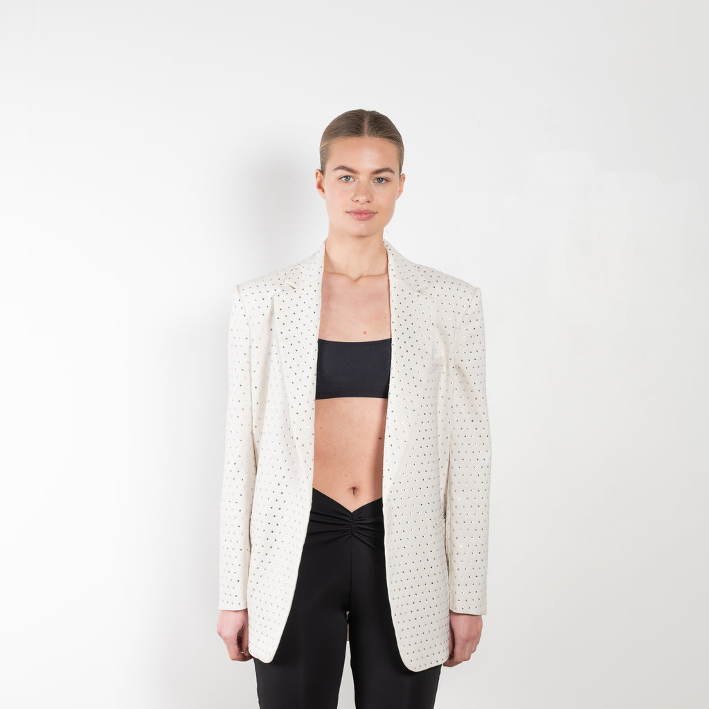 The Guia Blazer by The Andamane is a relaxed oversized blazer with all-over crystals in a bright white