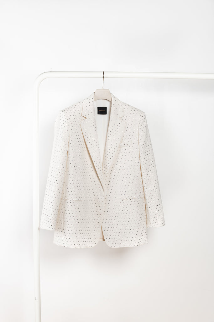 The Guia Blazer by The Andamane is a relaxed oversized blazer with all-over crystals in a bright white