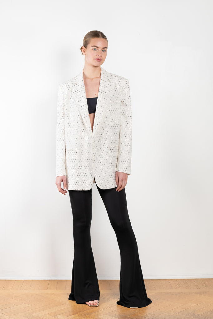 The Guia Blazer by The Andamane is a relaxed oversized blazer with all-over crystals in a bright white