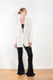 The Guia Blazer by The Andamane is a relaxed oversized blazer with all-over crystals in a bright white