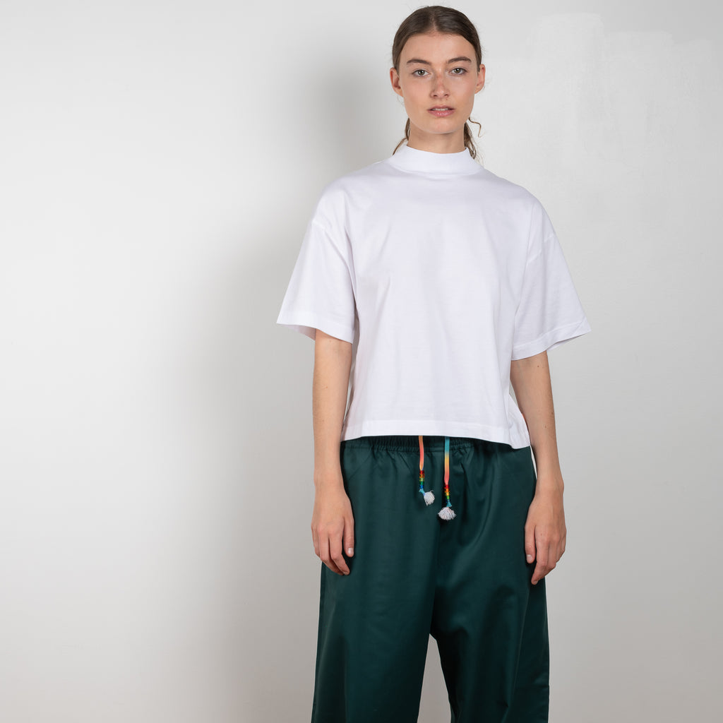 The Boxy T-shirt 240 by Acne Studios is a signature cropped and boxy tee with a mock neck, a true classic