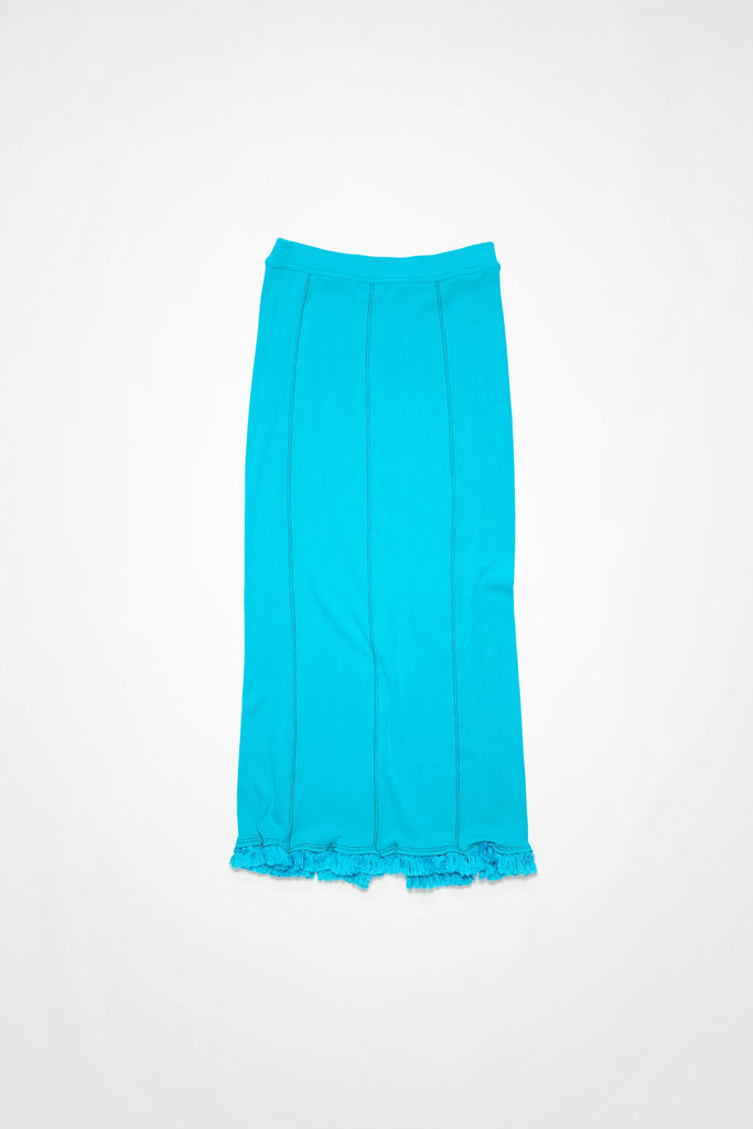 The Tassel Skirt 497 by Acne Studios is a turquoise pencil skirt with a ribbed finish, a tonal tassel at the bottom hem, stitching details and a back centre slit