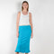 The Tassel Skirt 497 by Acne Studios is a turquoise pencil skirt with a ribbed finish, a tonal tassel at the bottom hem, stitching details and a back centre slit