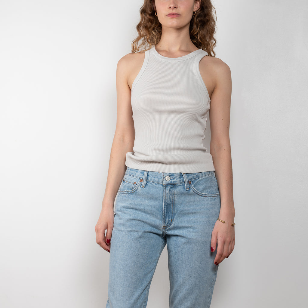 The Bailey Tank Top by Agolde is made from a ultra-soft heathered rib, it flatteringly hugs your frame with a scooped fit at the arm