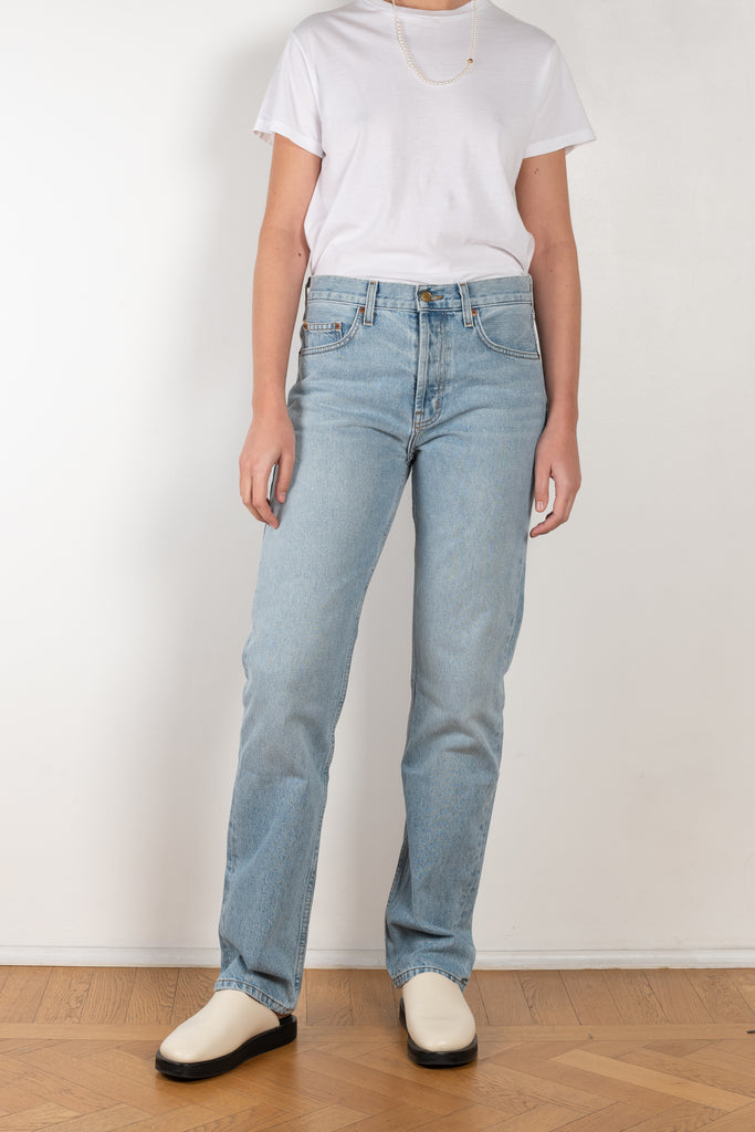 The Brit Jeans by B SIDES  is a mid waisted jeans with a full length straight leg in a mid blue wash