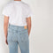 The Brit Jeans by B SIDES  is a mid waisted jeans with a full length straight leg in a mid blue wash