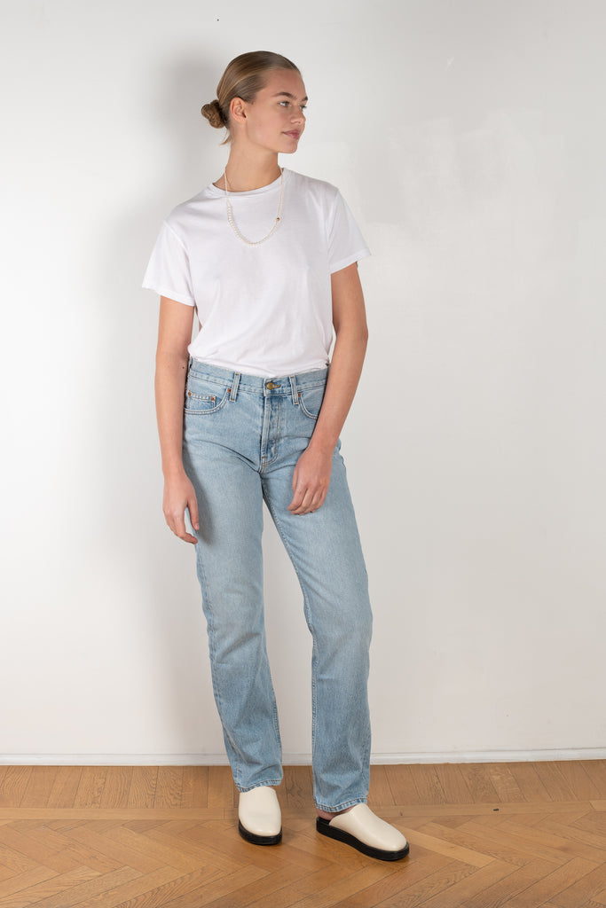 The Brit Jeans by B SIDES  is a mid waisted jeans with a full length straight leg in a mid blue wash