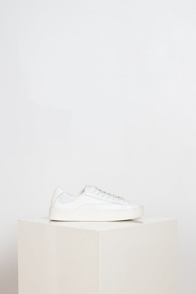 The Rodina Sneakers from By Far are comfy sneakers with a mesh and leather upper and a white tonal grained leather flash decorative detail