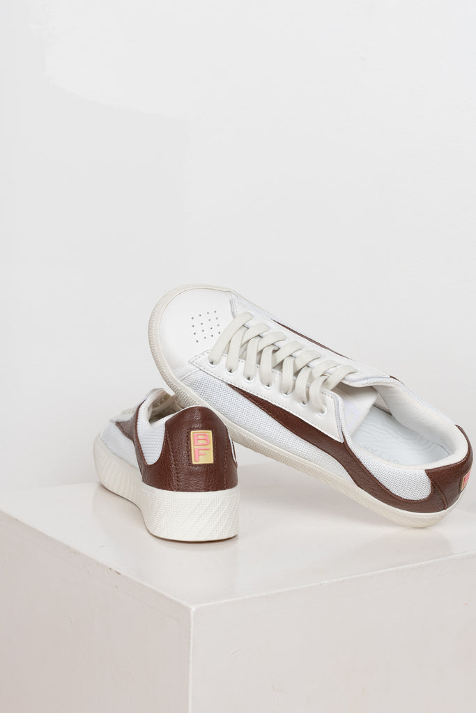 The Rodina Sneakers from By Far are comfy sneakers with a mesh and leather upper and a brown grained leather flash decorative detail