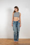 The Cropped Top by Gauchere is a fitted crop top with a high neckline and a contrasted logo label in the back