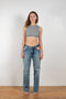 The Cropped Top by Gauchere is a fitted crop top with a high neckline and a contrasted logo label in the back