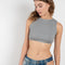 The Cropped Top by Gauchere is a fitted crop top with a high neckline and a contrasted logo label in the back