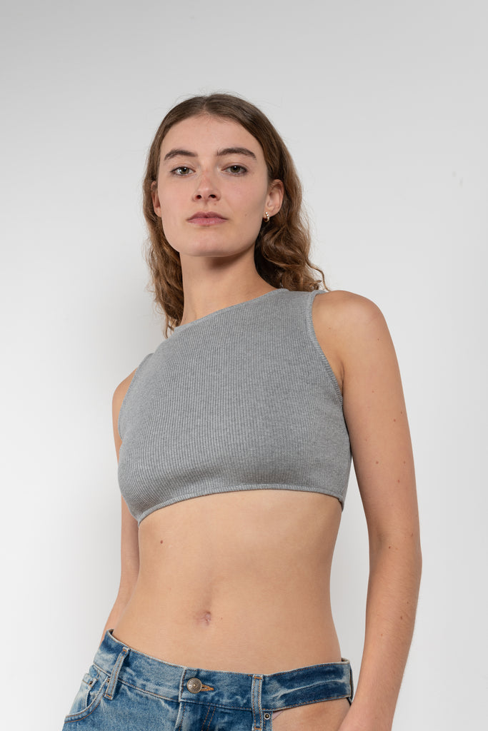 The Cropped Top by Gauchere is a fitted crop top with a high neckline and a contrasted logo label in the back