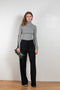 The Two Tone Top by Gauchere is a turtleneck top with a long slim fit in ribbed two tone cotton