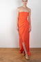 The Lica Long Dress by Gauge81 is a long silk bustier dress with front slit in a vibrant orange linen