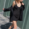 The Melun Dress by Gauge81 is a ribbed jersey mini dress with a scoop neckline and back