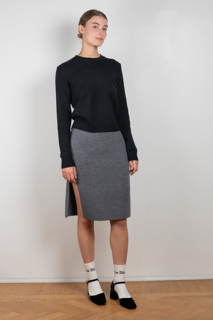 The Gabriella Skirt by Lisa Yang is a high waist skirt in a pure, organic, plain-knit cashmere with two side slits and can also be worn as a bustier top