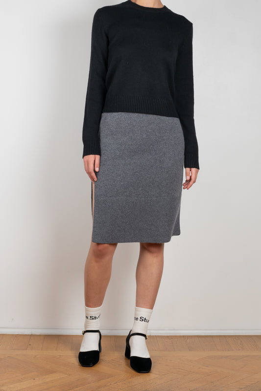 The Gabriella Skirt by Lisa Yang is a high waist skirt in a pure, organic, plain-knit cashmere with two side slits and can also be worn as a bustier top