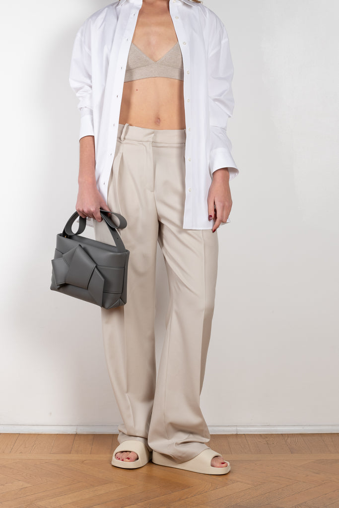 The New Sbiru Pants by Loulou Studio are signature suiting paints that sit on the waist, are ample and pleated at the waist