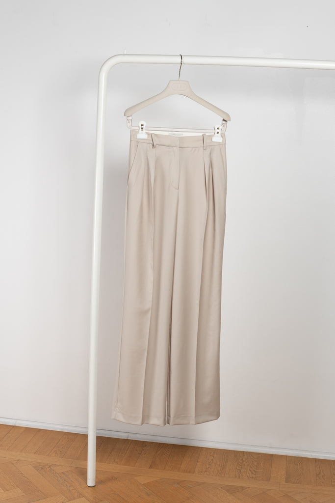 The New Sbiru Pants by Loulou Studio are signature suiting paints that sit on the waist, are ample and pleated at the waist