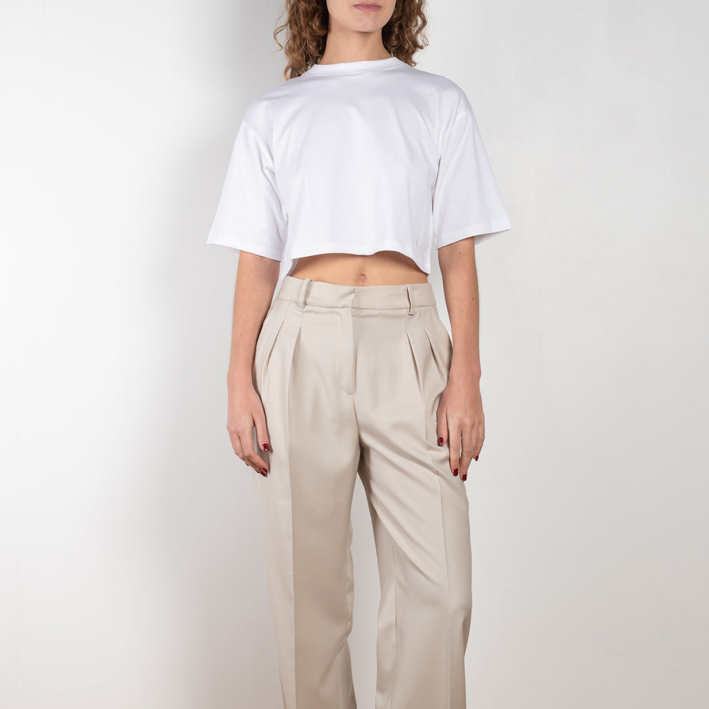 The New Sbiru Pants by Loulou Studio are signature suiting paints that sit on the waist, are ample and pleated at the waist