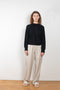 The Pemba Sweater by Loulou Studio is a boxy crew neck pullover with feminine sleeves in a soft cashmere