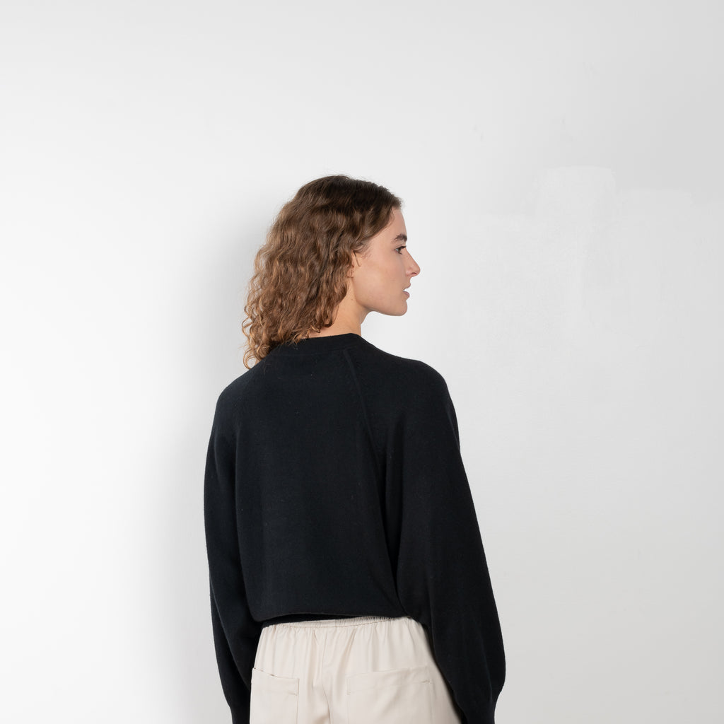 The Pemba Sweater by Loulou Studio is a boxy crew neck pullover with feminine sleeves in a soft cashmere