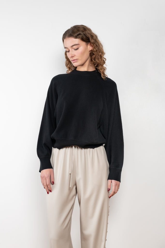 The Pemba Sweater by Loulou Studio is a boxy crew neck pullover with feminine sleeves in a soft cashmere