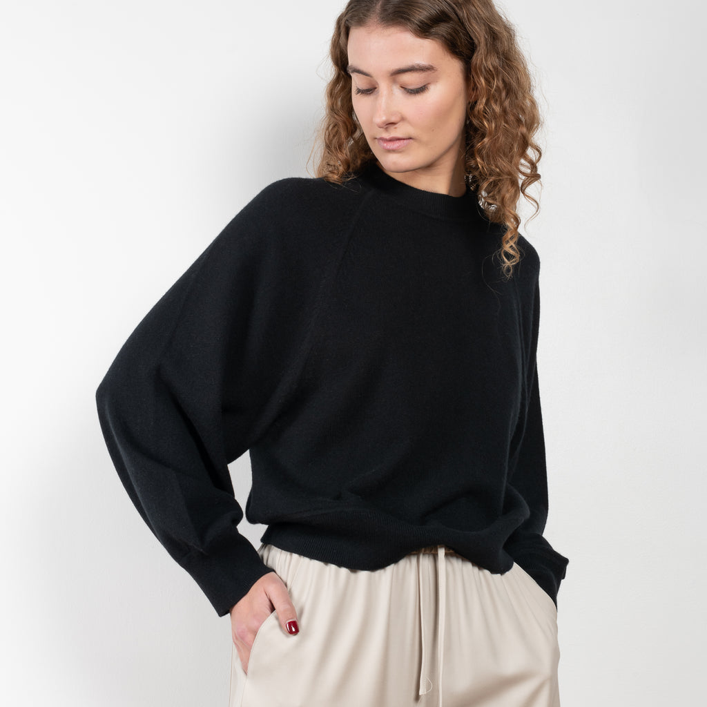 The Pemba Sweater by Loulou Studio is a boxy crew neck pullover with feminine sleeves in a soft cashmere