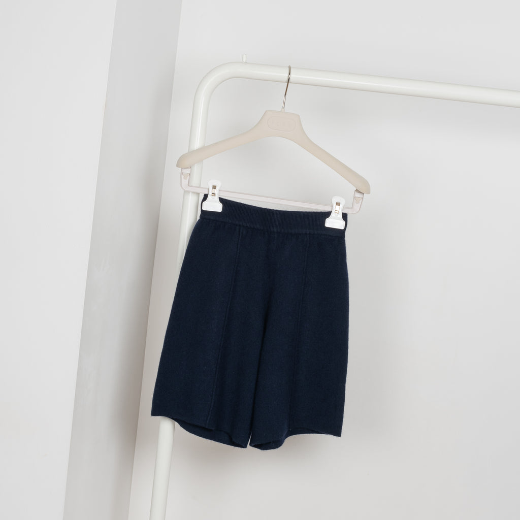 The Maris Short by Lisa Yang have a mid-thigh, wide-leg cut with stitched creases in a thick and soft cashmere