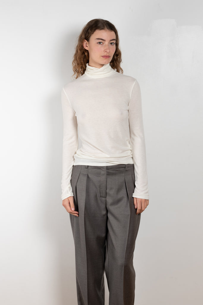 The Gallinara Turtleneck Tee by Loulou Studio is a fine ribbed turtleneck top in a soft wool blend 