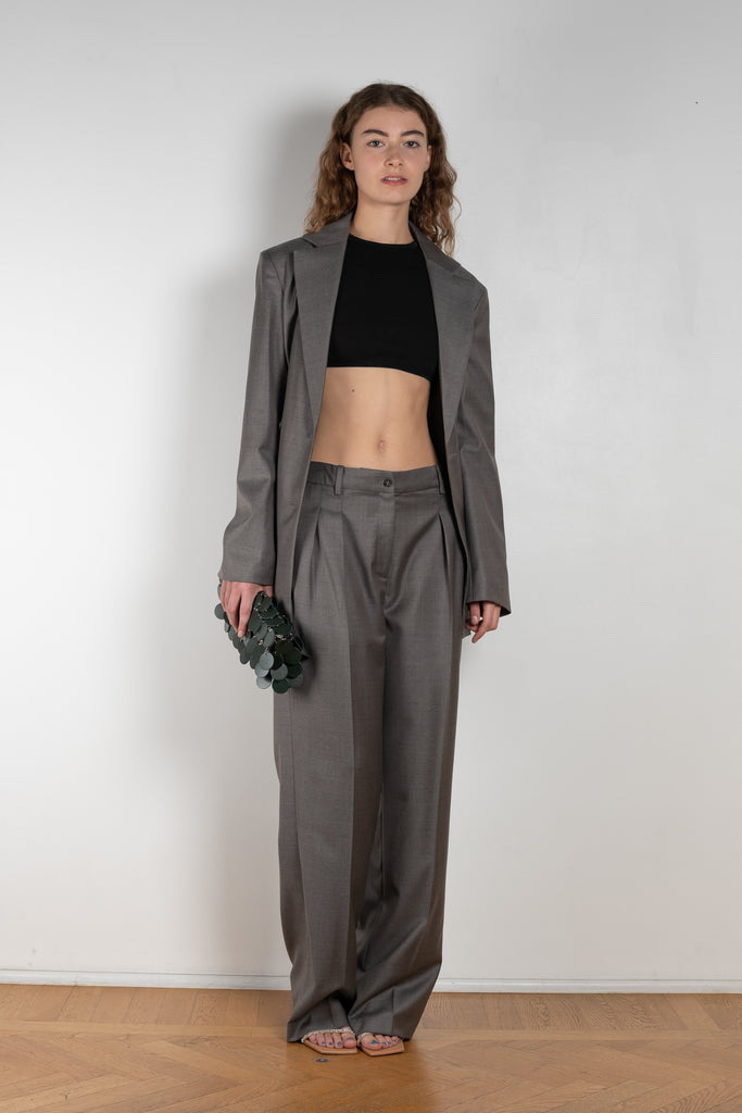 The New Sbiru Pants by Loulou Studio are signature suiting paints that sit on the waist, are ample and pleated at the waist