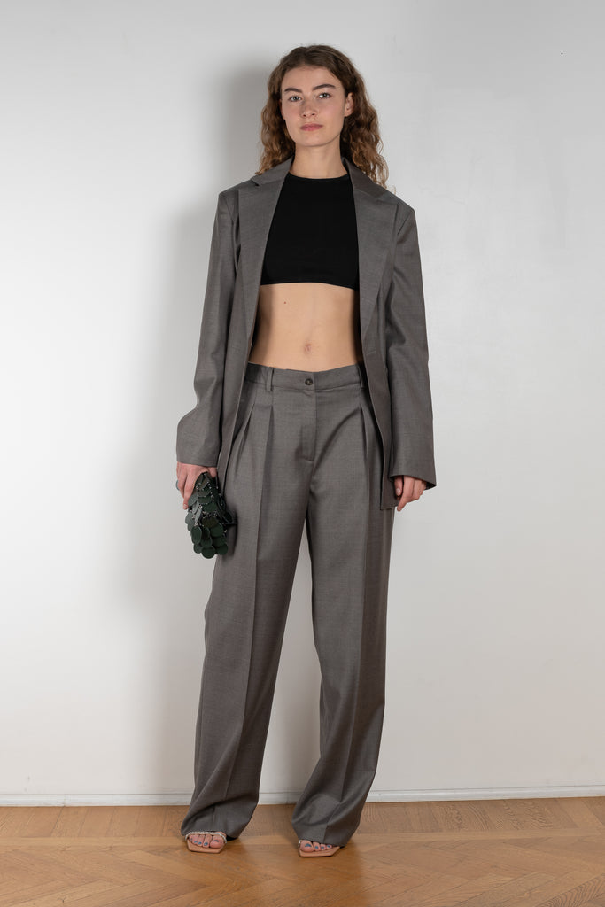 The New Sbiru Pants by Loulou Studio are signature suiting paints that sit on the waist, are ample and pleated at the waist