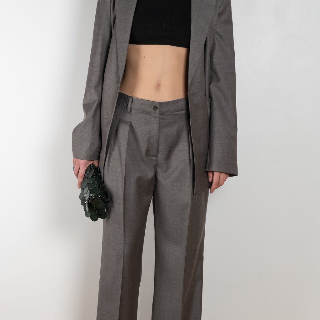 The New Sbiru Pants by Loulou Studio are signature suiting paints that sit on the waist, are ample and pleated at the waist