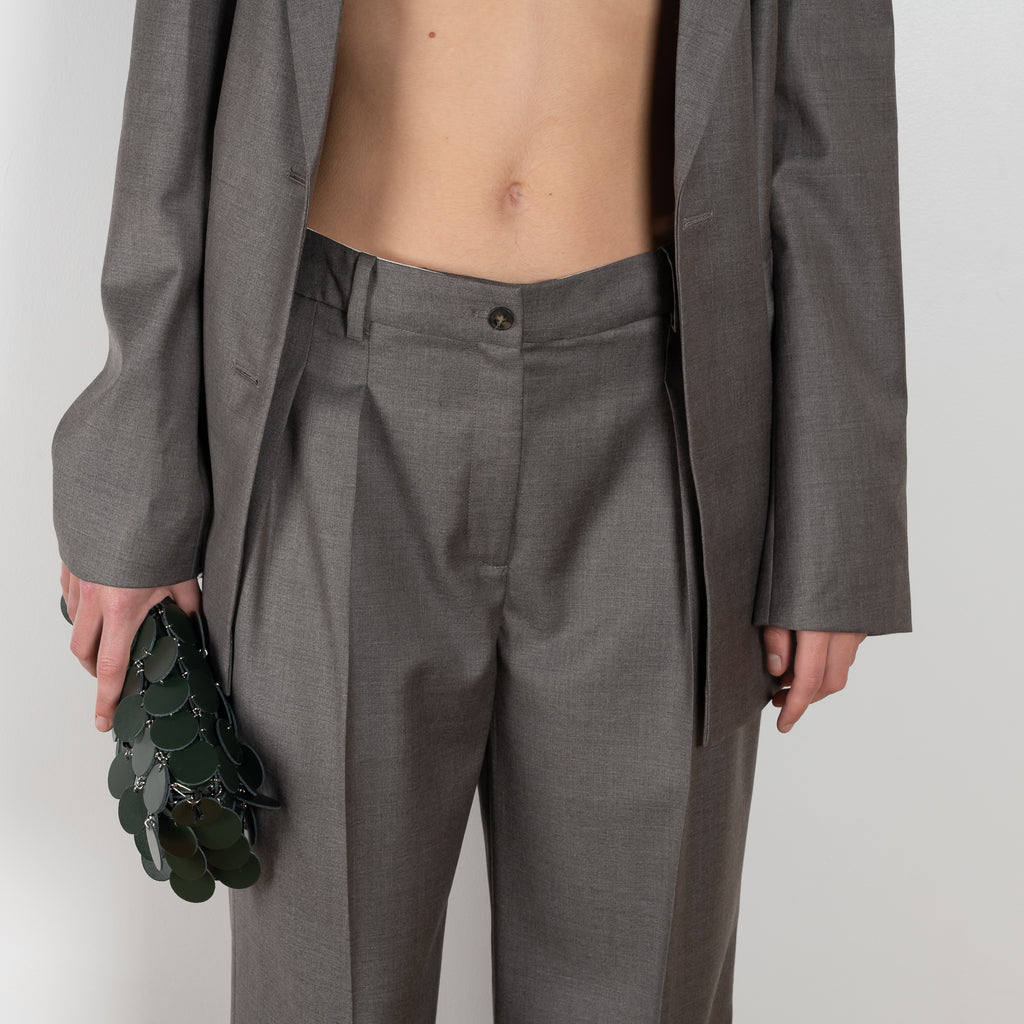 The New Sbiru Pants by Loulou Studio are signature suiting paints that sit on the waist, are ample and pleated at the waist