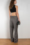 The New Sbiru Pants by Loulou Studio are signature suiting paints that sit on the waist, are ample and pleated at the waist