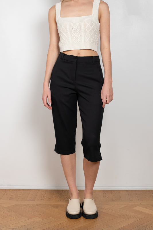 The Safal Short Pants by Loulou Studio is a high waisted fitted bermuda with a just below-the-knee length