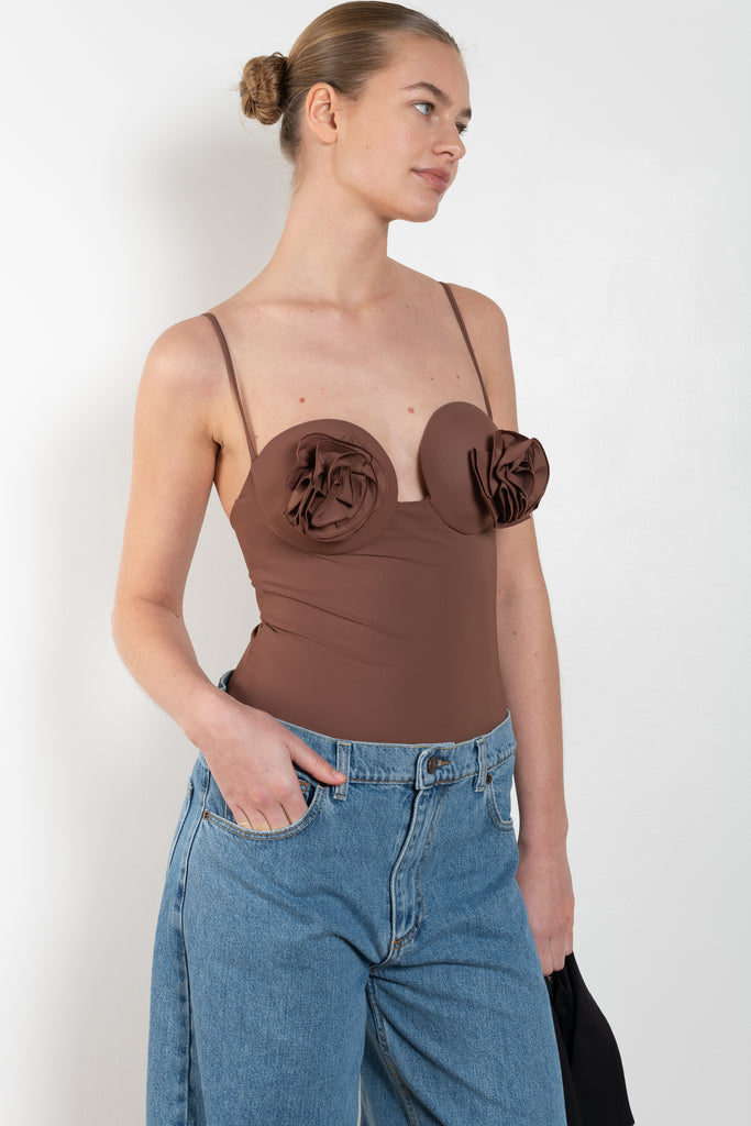 The Retro Bustier Swimsuit 01 by MAGDA BUTRYM is a retro one-piece swimsuit with a flower on each cup