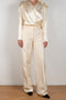 The Wide Leg Pants 08 by Magda Butrum are silk pants tailored with pleating, side pockets, belt loops, and a zip closure