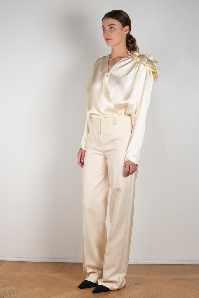 The Wide Leg Pants 08 by Magda Butrum are silk pants tailored with pleating, side pockets, belt loops, and a zip closure