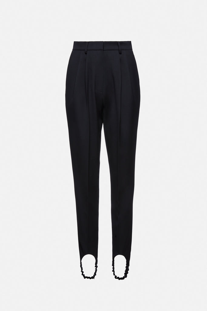 The Wool Stirrup Pants 01 by Magda Butrym is a classic wool skinny trousers with stirrup leg fastenings at the ankle